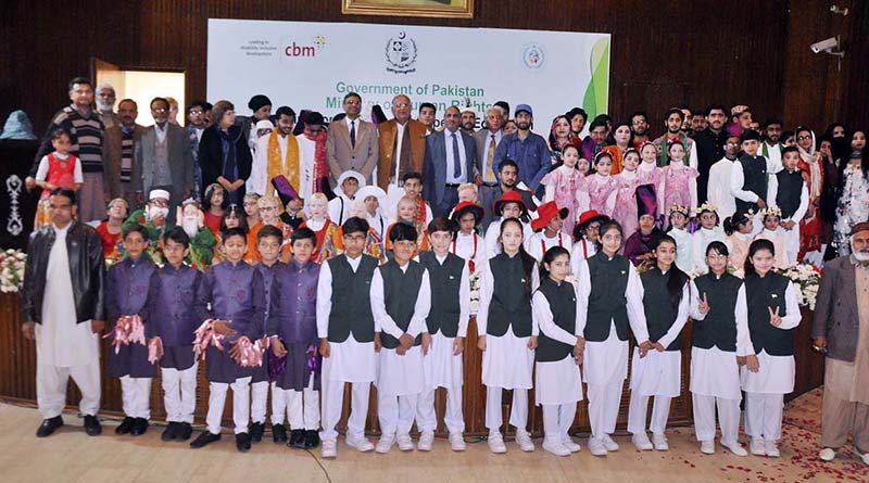 A Group photo with Federal Minister for Human Rights Mian Riaz Hussain Pirzada during the seminar on "International Day of Persons With Disabilities" organized by Directorate General of Special Education at National Library of Pakistan.