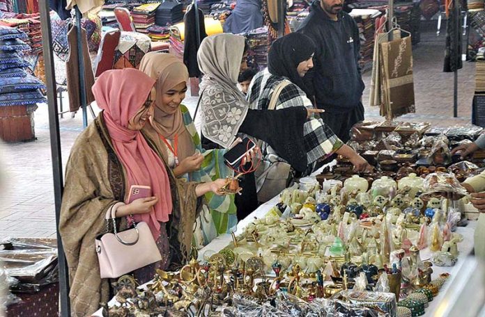 People visiting different stalls during Folk Festival ‘Lok Mela’ 2022 at Lok Virsa