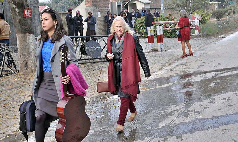 Christian community women on their way to attend religious rituals on Christmas day at Fatima Church F-8.