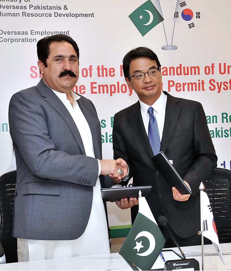 Federal Minister for Overseas Pakistanis & Human Resource Development Sajid Hussain Turi and Ambassador of the Republic of Korea in Islamabad Suh Sangpyo exchanging the documents during signing ceremony of Memorandum of Understanding on the Employment Permit System (EPS) between Ministry of Overseas Pakistanis & Human Resource Development Islamic Republic of Pakistan and Ministry of Employment and Labour the Republic of Korea