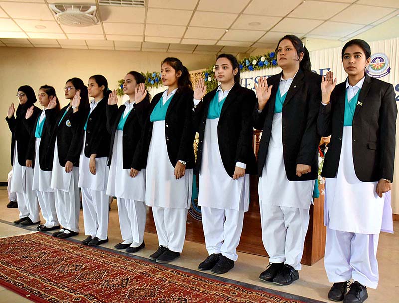Students of FG Home Economics and Management Sciences College F-11 taking oath during ceremony of Students Council
