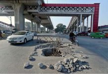 A view of damaged road near Mareer Chowk, Metro Station