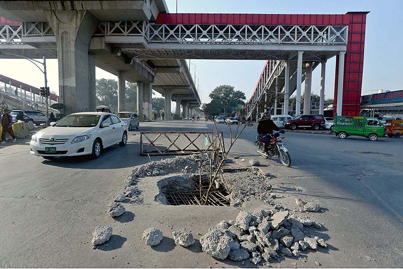 A view of damaged road near Mareer Chowk, Metro Station