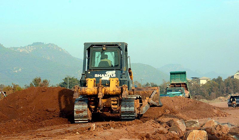 Construction work of Margalla Road being carried out during development work.