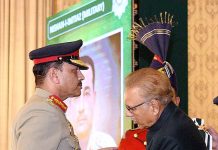 President Dr. Arif Alvi conferring the award of Nishan-i-Imtiaz (Military) upon the Chief of Army Staff (COAS), General Syed Asim Munir Ahmad Shah at a special investiture ceremony held at Aiwan-e-Sadr
