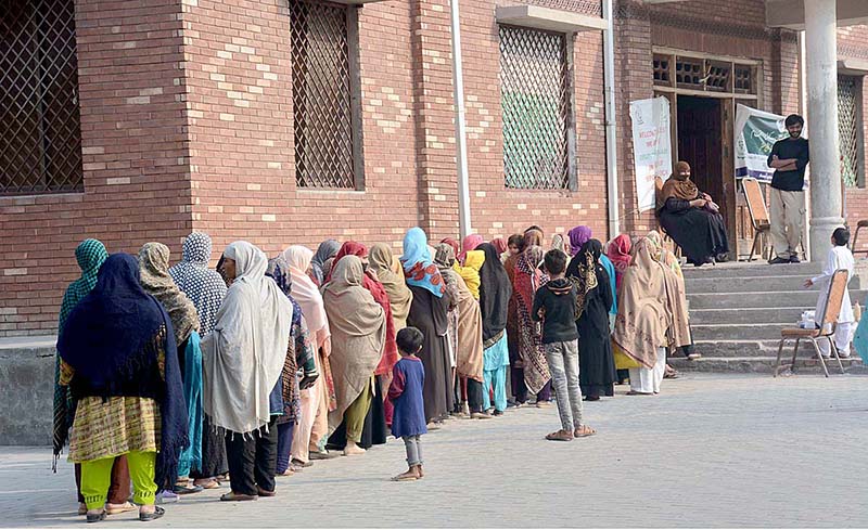 Many deserving women waiting for their turn to receive cash under Benazir Income Support Program by Govt. at Al-Fatah Sports Complex Saleemi Chowk