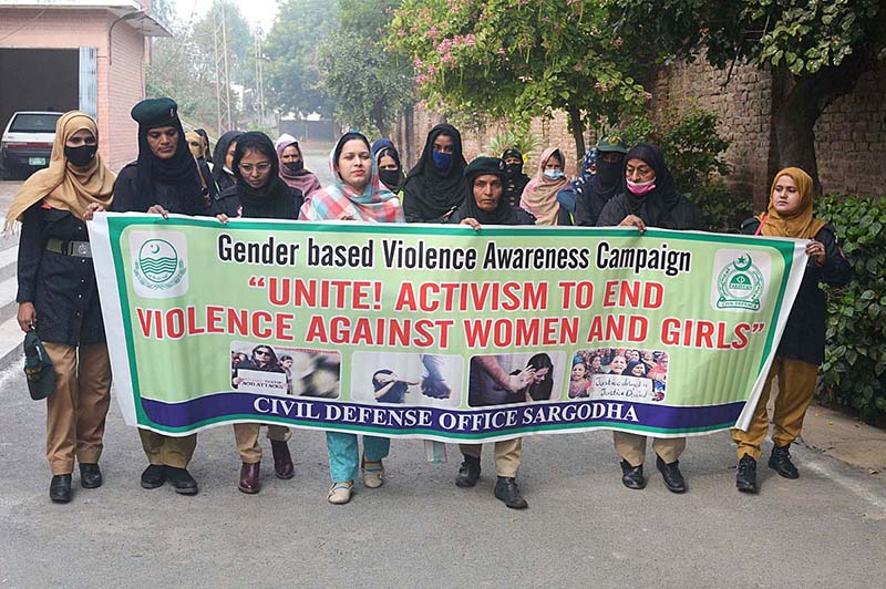 Civil Defence Officer Saira Rafique Khan leading awareness walk on activism to end violence against women and girls