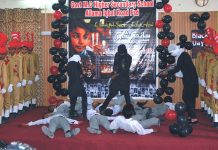 Students are performing tableau to tribute martyrs of APS Peshawar at Govt M.C Higher Secondary School Allama Iqbal Road
