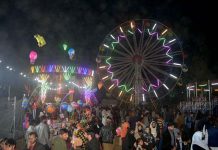 Family enjoys during “Lok Mela” organized by PHA.