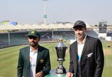 Pakistan Cricket Team captain Babar Azam and New Zealand's captain Tim Southee posing for photograph after unveiling Test Series Trophy ahead of first Cricket Test match at the National Stadium.