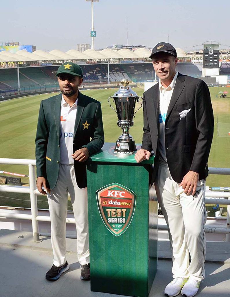 Pakistan Cricket Team captain Babar Azam and New Zealand's captain Tim Southee posing for photograph after unveiling Test Series Trophy ahead of first Cricket Test match at the National Stadium.