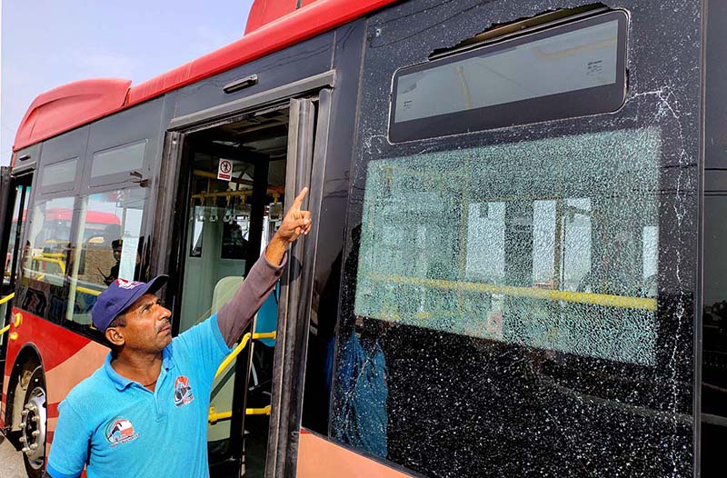 Driver is describing the damage to the bus as unknown persons opened fire on the People's Bus Service at overhead bridge, no casualty happen in the incident