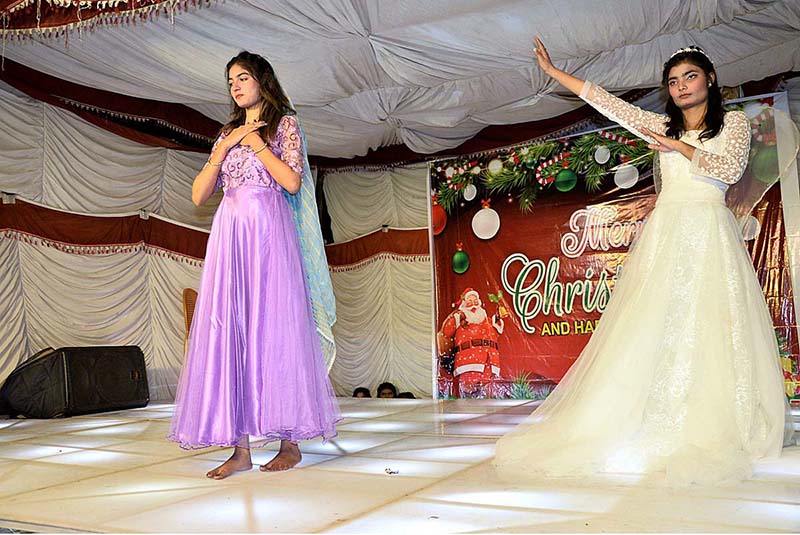 Christian students performing tableau during stage drama at St. Anthony Catholic Church in connection with upcoming Christmas