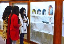 Girls taking keen interest in stuff placed at Sindh Museum