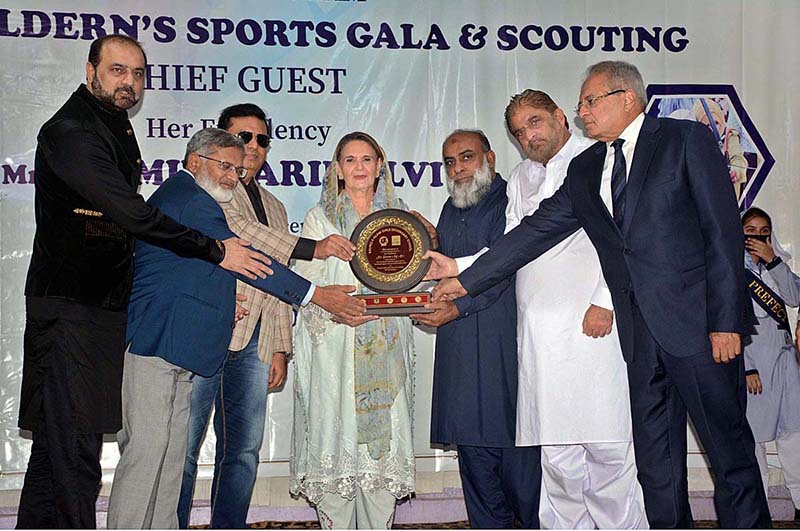 A differently-abled girl presenting bouquet to Begum Samina Arif Alvi on her arrival at Special Children’s Sports Gala and Scouting event organized by Institute of Holistic Rehabilitation and Inclusion (IHRI) in collaboration with World Memon Organization at Raunaq-e-Islam Girls Secondary School