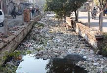 A view of garbage filled sewerage exit at Faridabad area creating environmental problems and needs the attention of concerned authorities