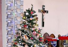 Christian community decorates the Saint Joseph Catholic Church on the eve of Christmas celebrations.