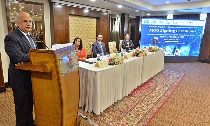 Special Assistant to the Prime Minister on Government Effectiveness Muhammad Jahanzeb Khan addressing the MOU signing ceremony in a local hotel