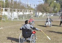 Special persons are participating in badminton competition during the "International Day of Persons with Disabilities 2022" at PRCS HQ