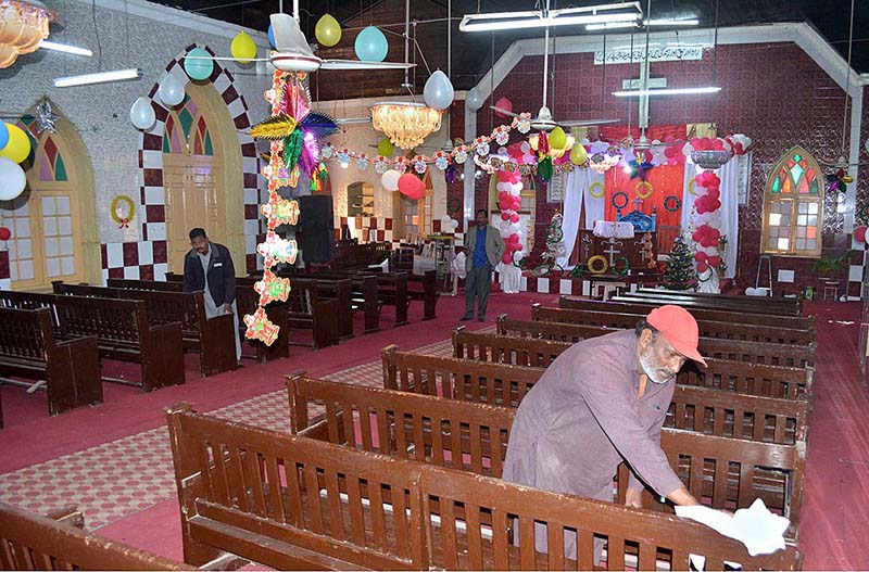 People from Christian community are decorating the UP Church at Nori Gate for upcoming Christmas