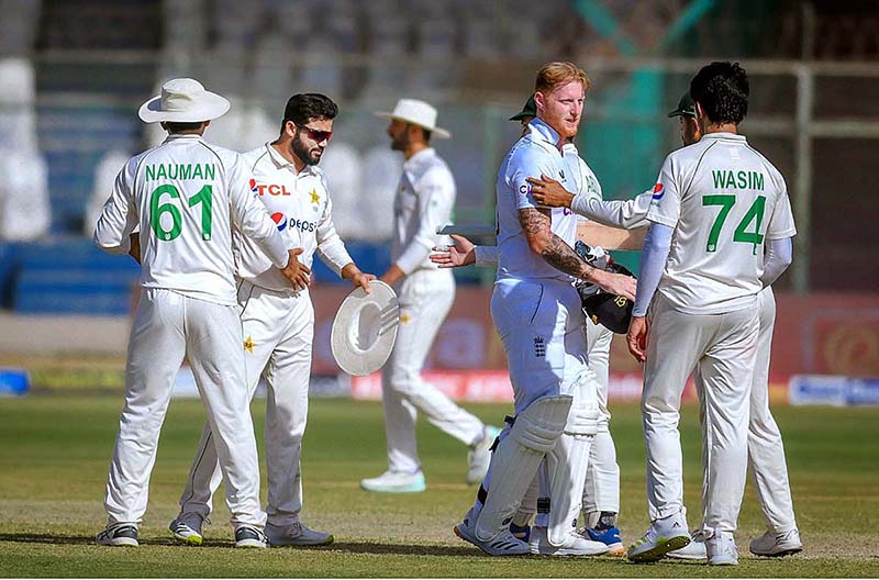 Ben Duckett celebrates after winning the third test cricket match against Pakistan at the National Stadium