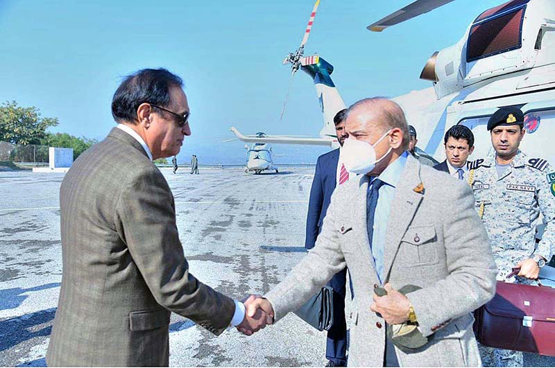 Chairman WAPDA Lt. General (R) Sajjad Ghani receives Prime Minister Muhammad Shehbaz Sharif upon his arrival at Mangla Dam to inaugurate Unit 5 and Unit 6 of Mangla Dam after their refurbishment