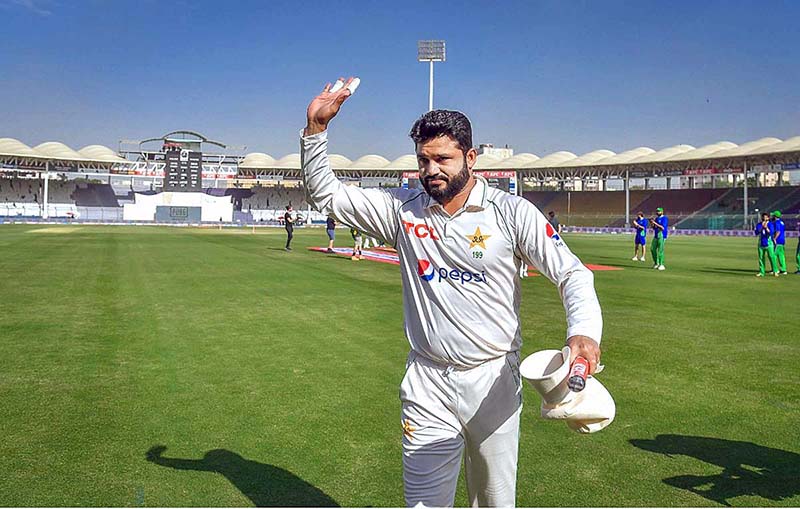 Ben Duckett celebrates after winning the third test cricket match against Pakistan at the National Stadium