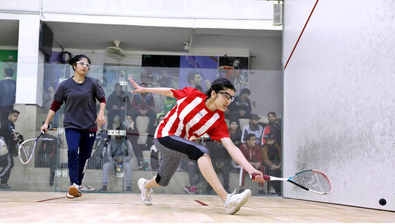 players in action during PSF-National Squash Championship at Mushaf Squash Complex