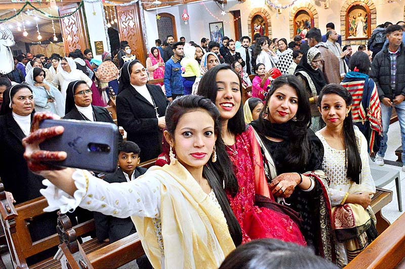 Christian community performing their religious rituals on the occasion of Christmas Day celebrations at St. Francis Xavier’s Cathedral Church