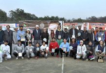 A group photograph with Chief Guest Senator Taj Haider Chairman organizing committee with players of 8th Benazir Bhutto Shaheed National Tennis Championship during closing ceremony held at Islamabad Tennis Complex