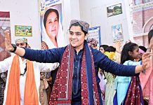 Student performing during cultural program to mark the Sindhi Ajrak Topi Culture Day at Government Girls Higher Secondary School