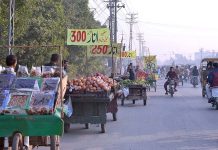 Fruit and dry fruit vendors are attracting customers by displaying selling rate on their carts.