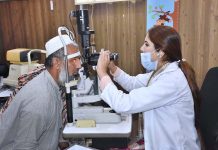 Eye Specialist check eye sight of a patients in free medical camp at Al-Sheikh Jinnah Memorial Welfare Teaching Hospital