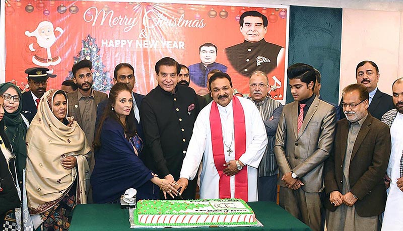 Speaker National Assembly Raja Pervez Ashraf cutting cake in connection with Christmas celebrations at Parlialment House