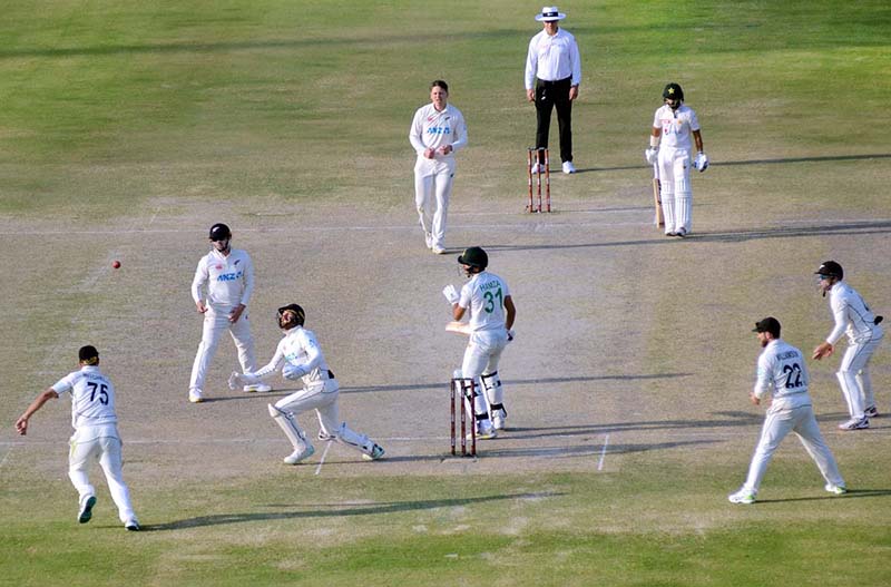 New Zealand fielders struggling to catch the ball played by Pakistan’s batter Mir Hamza during the fifth and final day of the first Test match between Pakistan and New Zealand at the National Stadium