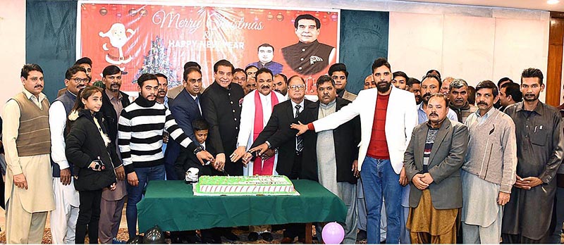 Speaker National Assembly Raja Pervez Ashraf cutting cake in connection with Christmas celebrations at Parlialment House