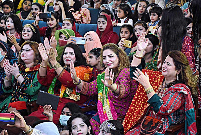 Student performing during cultural program to mark the Sindhi Ajrak Topi Culture Day at Government Girls Higher Secondary School
