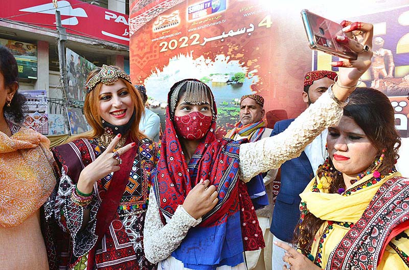 Female singer performing a sindhi song on the stage during culture program during the Sindhi Ajrak Topi culture day at radio Pakistan road.