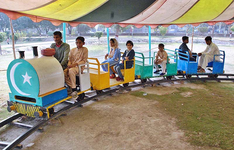 Children enjoying mini-train ride at Commercial Area Park after recent renovation work of the park