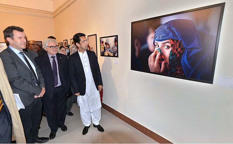 Shahram Khan Tarakai KP Minister for Elementary & Secondary Education and German Ambassador to Pakistan Alfred Grannas viewing the photographic exhibition on "Pakistan Merged Areas a Tribal Society on its way to Local Governance" at Pakistan National Council of Arts