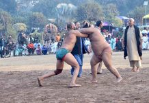A view of traditional desi dangal (wrestling) Game of glimpse into past at Winter Family Festival organized by PHA