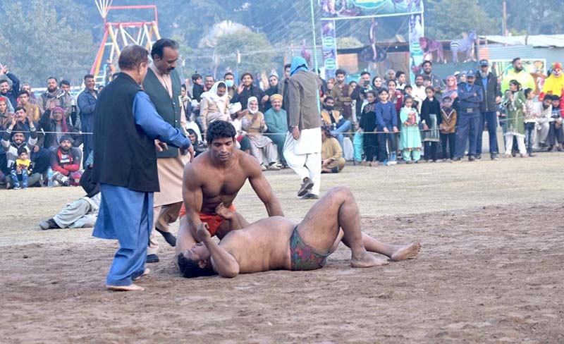 A view of traditional desi dangal (wrestling) Game of glimpse into past at Winter Family Festival organized by PHA