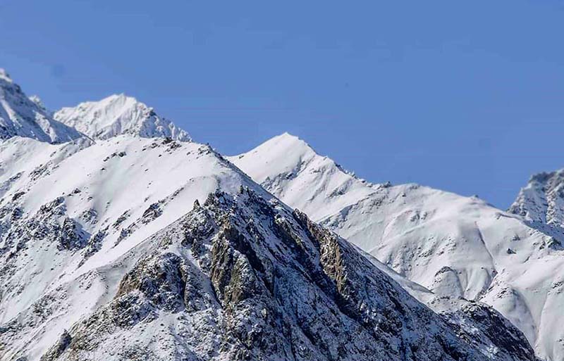 An attractive view of fresh snow carpeted mountain in the northern area of Pakistan