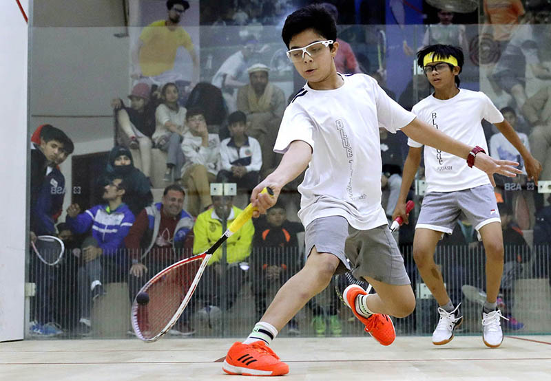 players in action during PSF-National Squash Championship at Mushaf Squash Complex