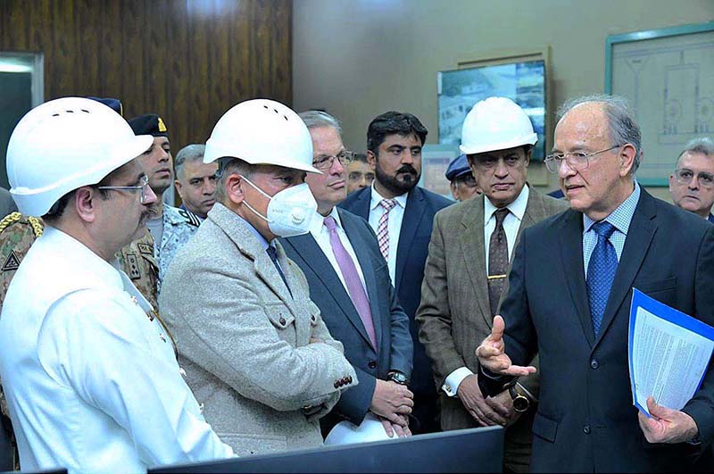 Prime Minister Shehbaz Sharif being briefed about the refurbishment project of Mangla Dam and about the operations of the newly inaugurated units