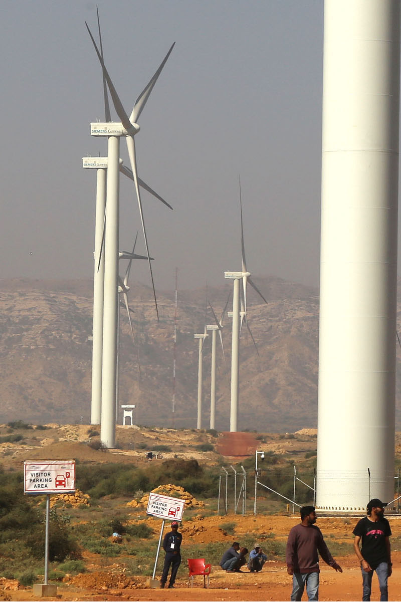 A view of large number running wind power plants near NTDC Grid Station Jhimpir II which dispatch renewable energy to national grid.