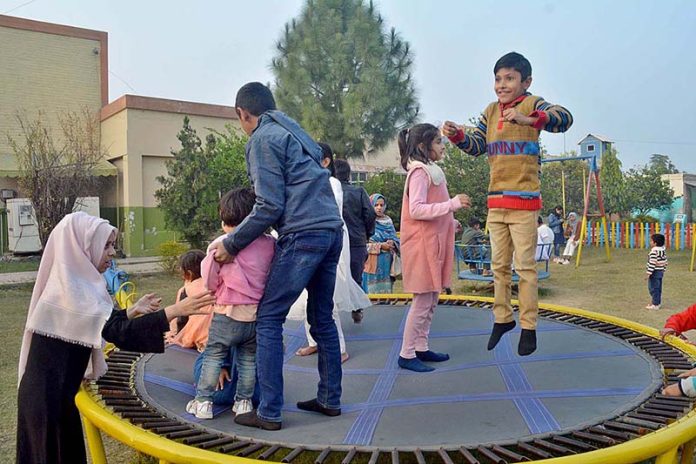 Children enjoying on the Jumping jack in a local Park