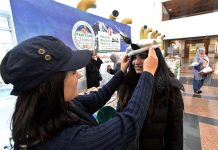 A girl is wearing traditional (pakol) cap during closing ceremony of 12th Pakistan Mountain Festival organized by Devcom-Pakistan and Pakistan National Council of the Arts