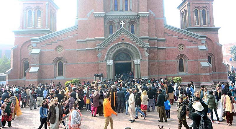 People from Christian community performing their religious rituals during special service on Christmas Day at St Peter’s Church.