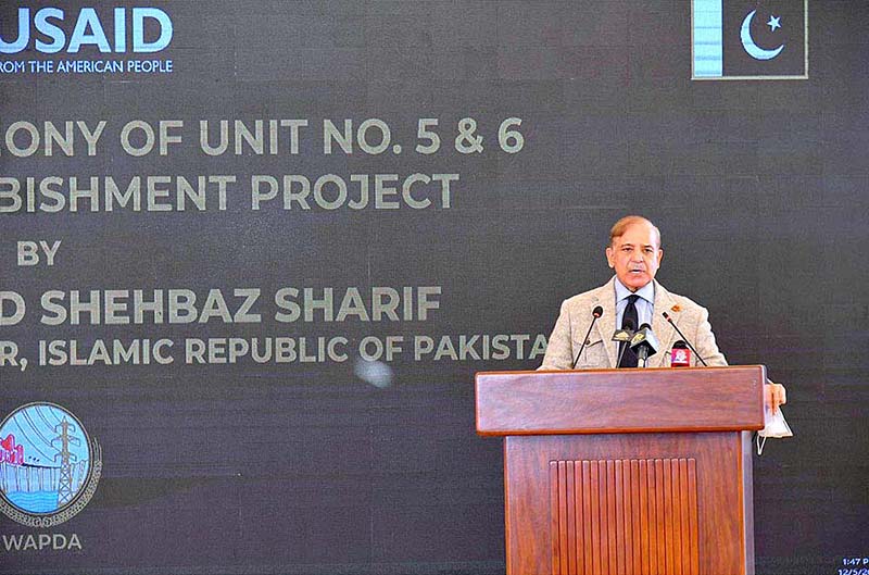 Prime Minister Shehbaz Sharif addressing the inaugural ceremony of the refurbishment of unit 5 and 6 of Mangla Dam